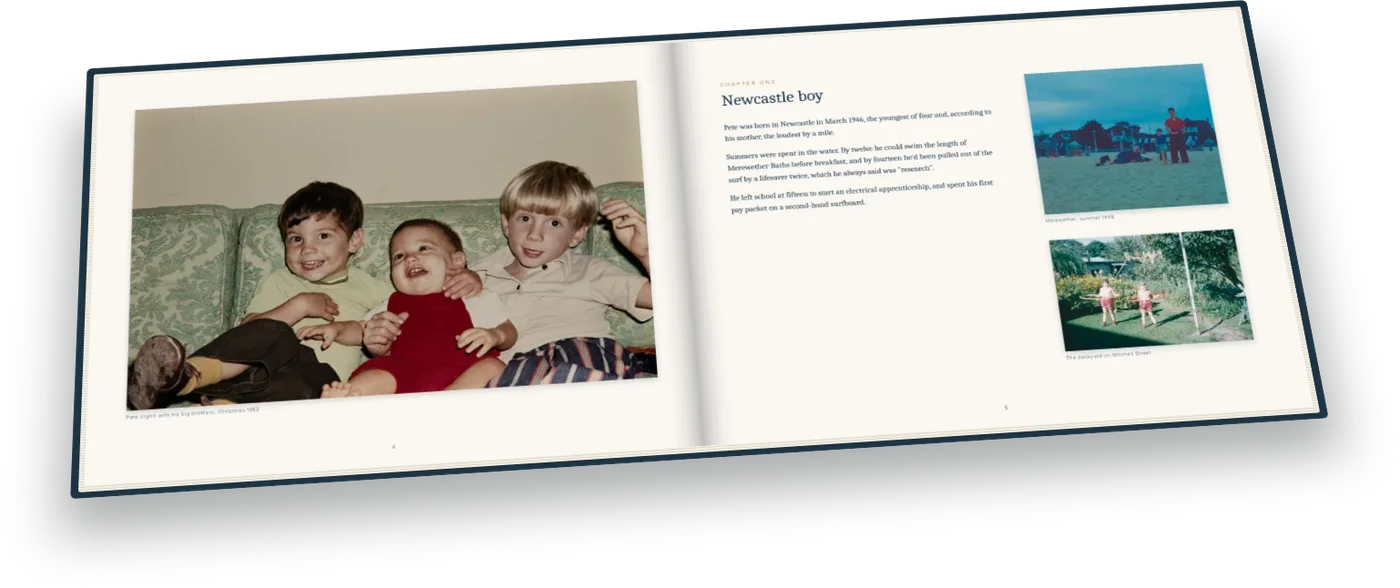 The sample memory book lying open at chapter one, with childhood photos and the story of growing up in Newcastle